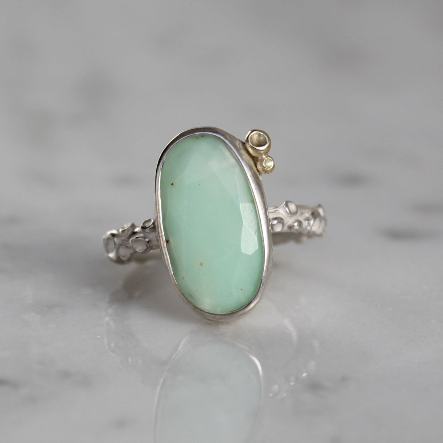 Zilveren ring met mintgroene steen
